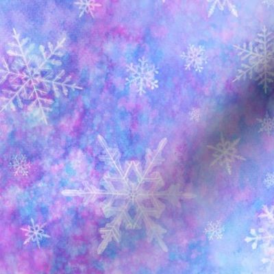 Pastel blue and purple watercolor snowflakes, winter sky