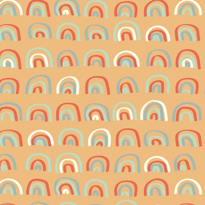 Soft colored rainbows on orange background - large