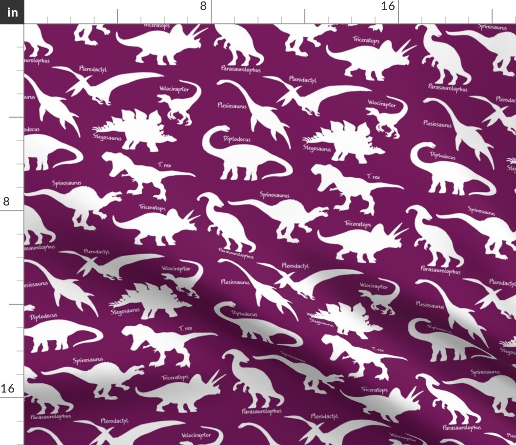 White Dinosaurs with names over Dark Purple 