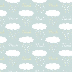 Noah baby boy name fabric with white clouds on light blue