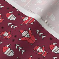 Little origami santa claus design little santas and geometric detailing abstract Christmas seasonal design burgundy red