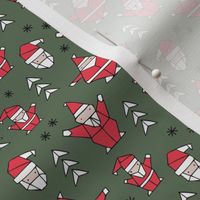 Little origami santa claus design little santas and geometric detailing abstract Christmas seasonal design cameo green red