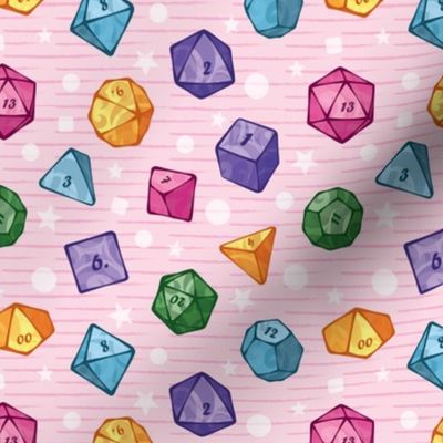 Cute colorful dice on pink