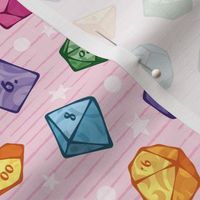 Cute colorful dice on pink