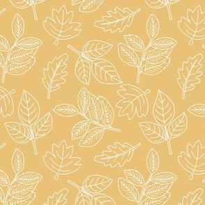 Delicate Scandinavian boho style autumn leaves oak maple and birch ochre yellow honey baby nursery 