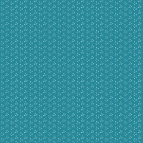 cream sprigs on textured teal