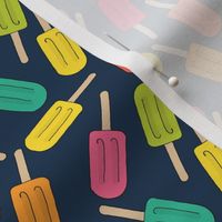 Small Colorful Ice Pops on Navy Blue
