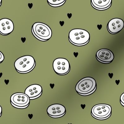 Tiny buttons -on Gray beige background