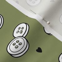 Tiny buttons -on Gray beige background