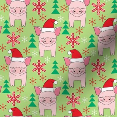 medium pink christmas pigs on green