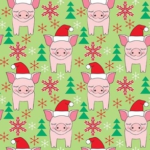 medium pink christmas pigs on green