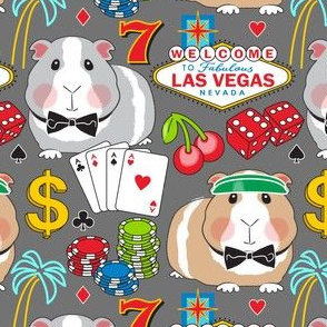 large guinea pigs at the casino on dark grey