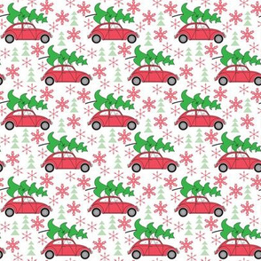 small christmas cars on white