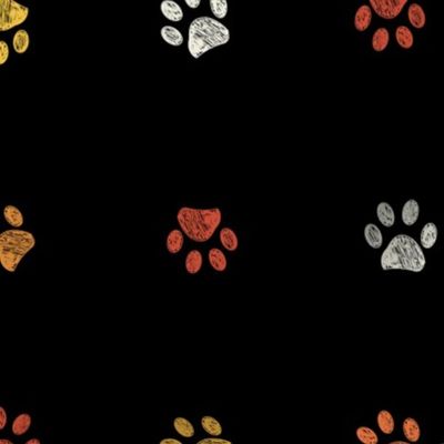Orange  yellow and white doodle paw prints with black background seamless pattern. Happy Hallooween background