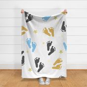 Baby foot prints with gold shining stars. Seamless pattern for fabric design