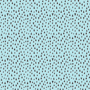 Scattered modern triangles on baby blue
