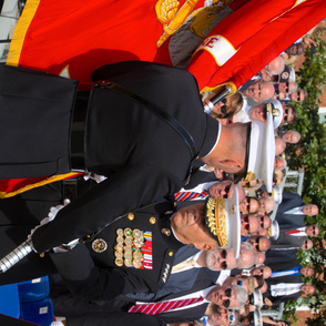 93-12 Commandant of the Marine Corps, Gen. Robert B. Neller, center, accepts the Marine Corps colors from Gen. Joseph F. Dunford, Jr. 