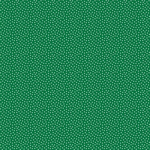 White 2.5 mm polka dots on green ground