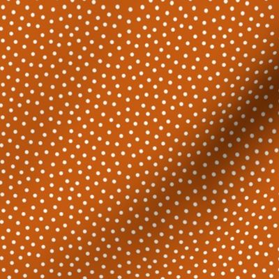 White 2.5 mm polka dots on autumn brown ground