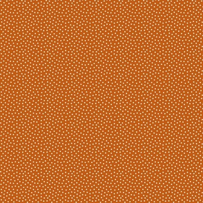 White 2.5 mm polka dots on autumn brown ground