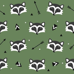 Racoons on green background