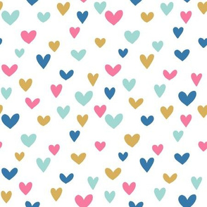 Bright colored hearts on white background