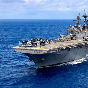 100-9  Amphibious assault ship USS America (LHA 6) transits the Philippine Sea.