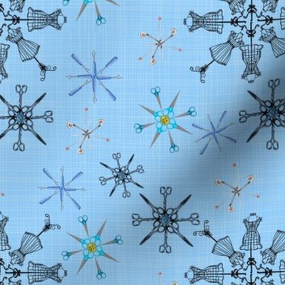 sewing snowflakes on baby blue