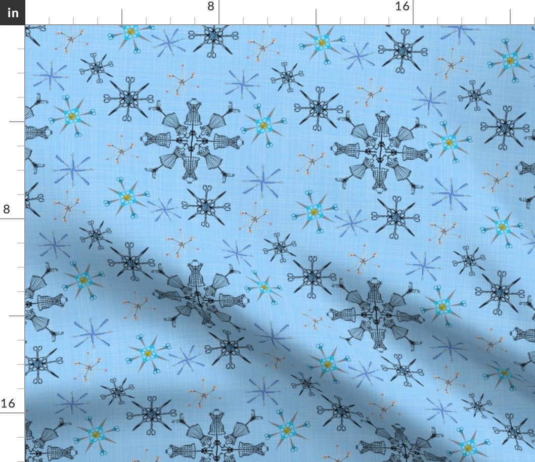 sewing snowflakes on baby blue