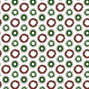 Red and green wreaths on a white background.