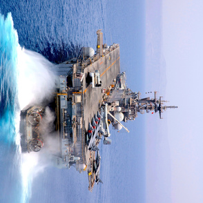 103-7 A landing craft air cushion (LCAC) enters the well deck of the amphibious assault ship USS Kearsarge