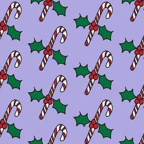 Candy canes on lilac