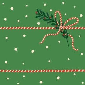 Christmas wrapping (green spotty paper) 