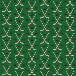 Hockey Sticks and Pucks on Dark Green