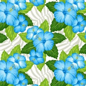 Tropical green leaves and blue hibiscus flowers