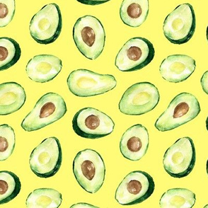 avocado's halves on a yellow background