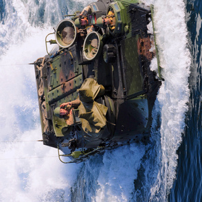 103-13 An amphibious assault vehicle assigned to the 11th Marine Expeditionary Unit (11th MEU) approaches the amphibious assault ship USS Makin Island.