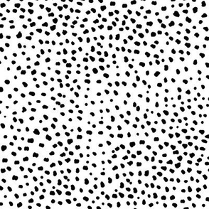 Fat cheetah baby animal print minimal small speckles and spots abstract wild cat white snow leopard monochrome black and white