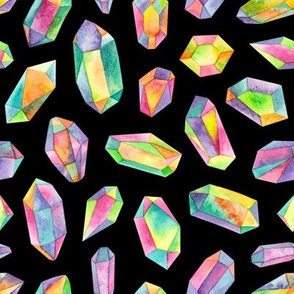 rainbow gemstones on a black 