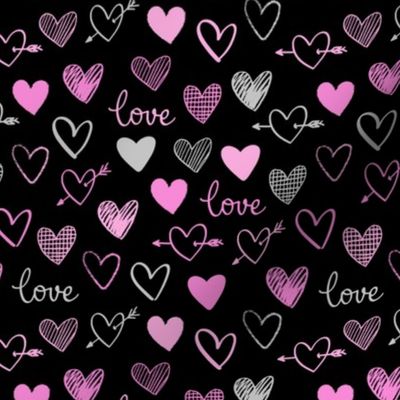 pink and gray hearts on a black background