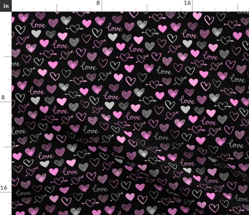 pink and gray hearts on a black background