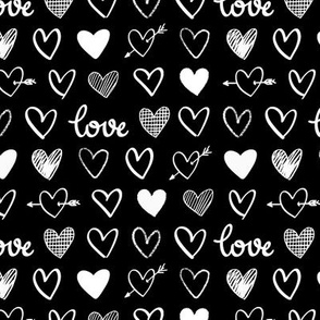  white love and hearts on a black background