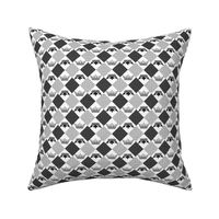 Black white checkered seamless pattern with crowns