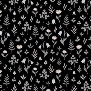 bellflowers and leaves on black