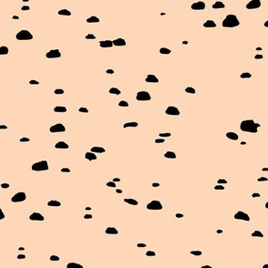 Messy ink speckles stains spots and dots abstract animal print texture boho nursery soft pale peach black