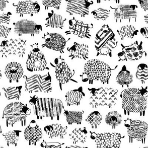 Monochrome sheep and cows