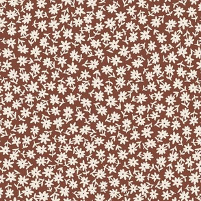 Disty floral cream on warm brown