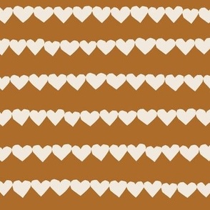 valentines day fabric heart strings on golden brown