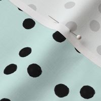 mint with black polka dots
