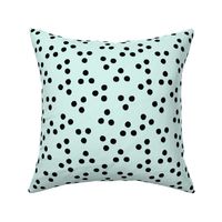 mint with black polka dots